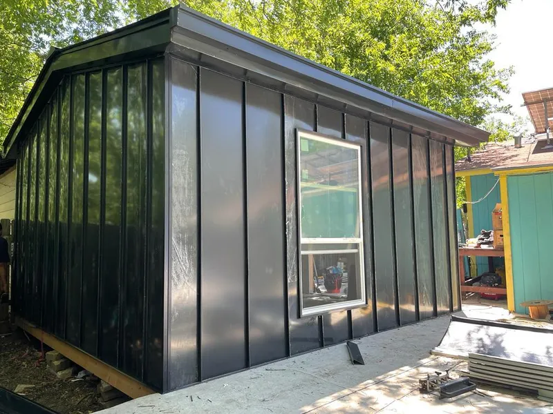 Black standing seam metal wall panels for Roof Inspection in Credit River