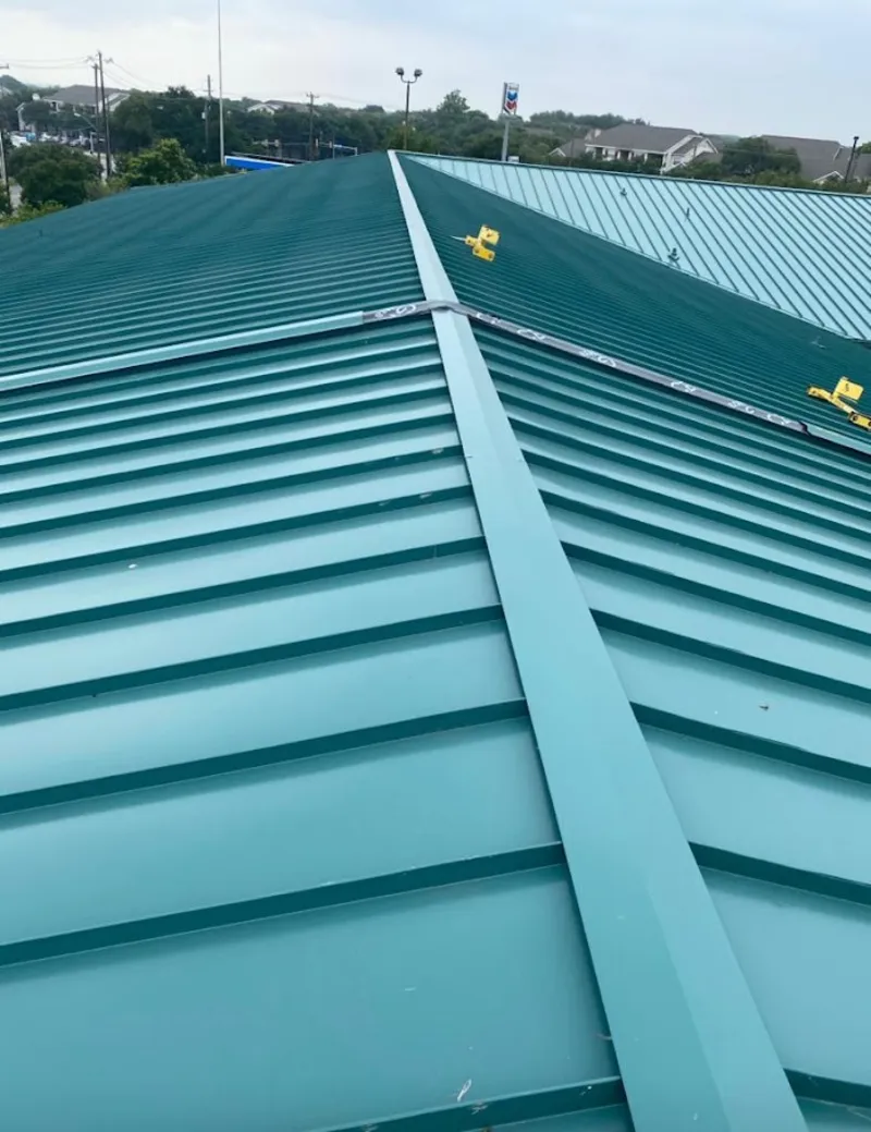 Green commercial metal roof ridge and valley for Metal Roof Repair in Credit River